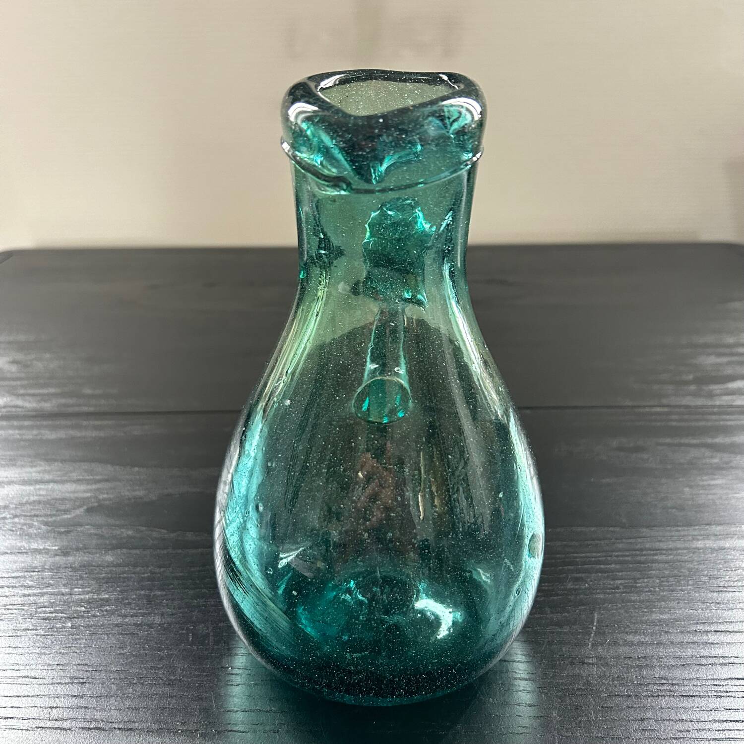 Bluish blown glass carafe