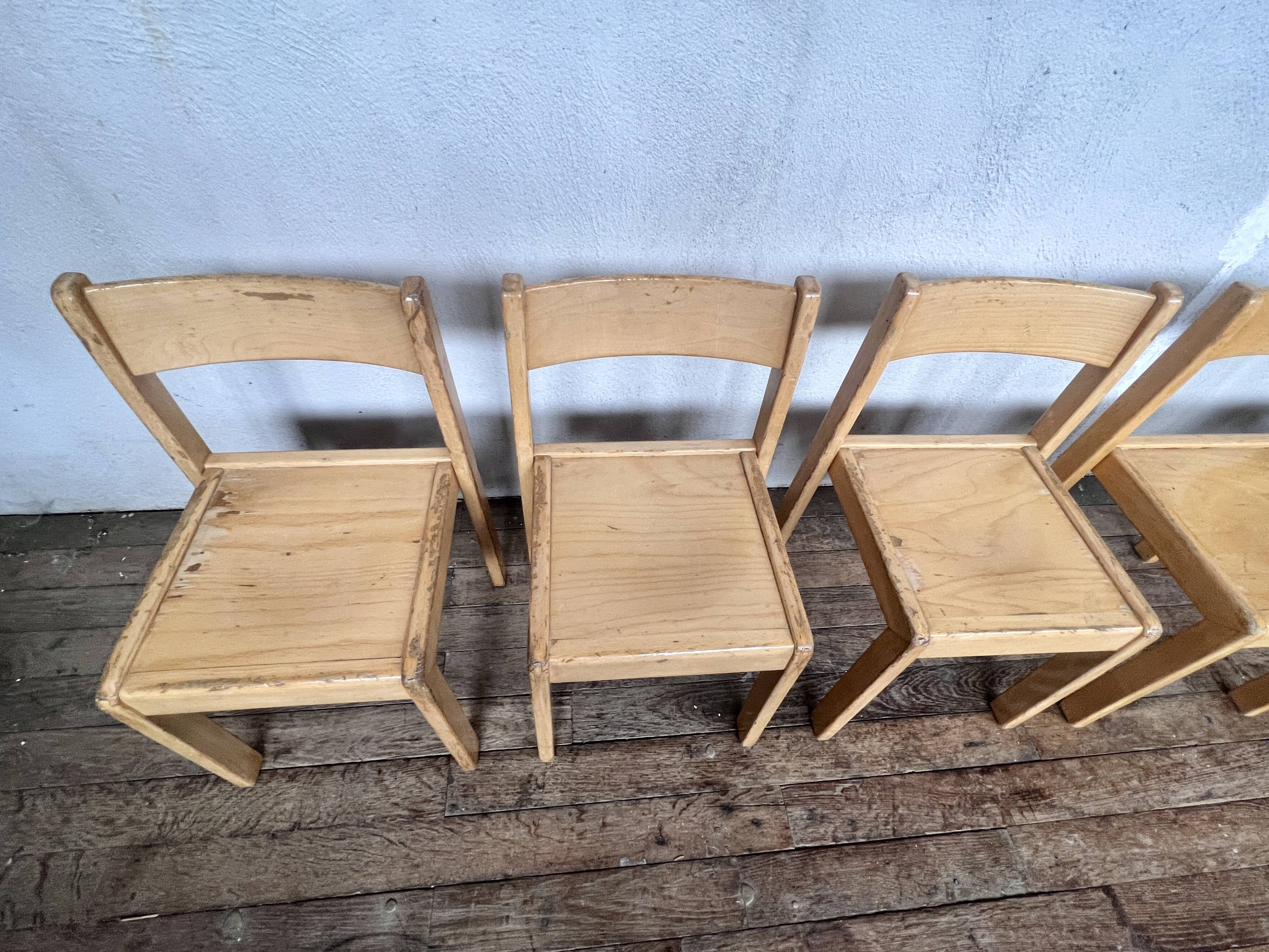 Series of 7 vintage Scandinavian bohemian wooden children's chairs