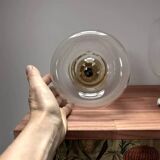 Pair of two-tone globe wall lights