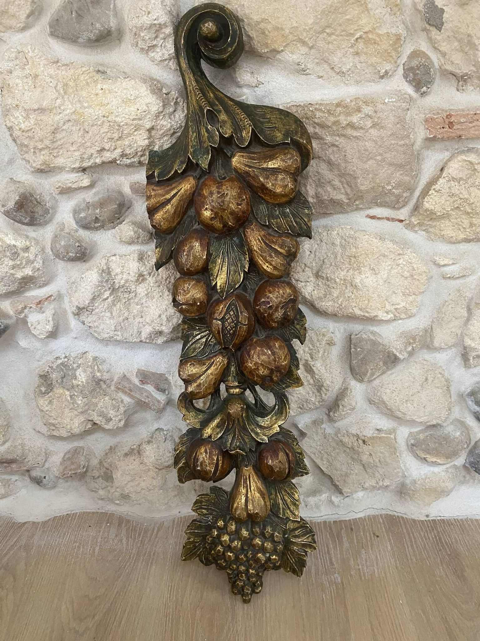 Large wall sculpture in carved gilded wood – fruits and foliage –