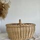 Large vintage wicker basket and blue lining with white polka dots