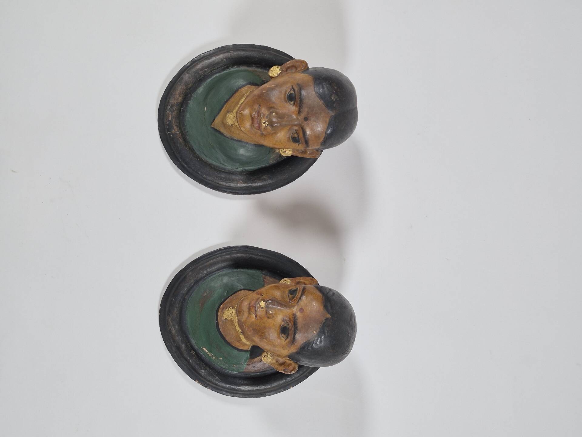 Pair of antique ceramic portrait busts from Rajasthan