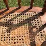 Old baby high chair in wood and canework