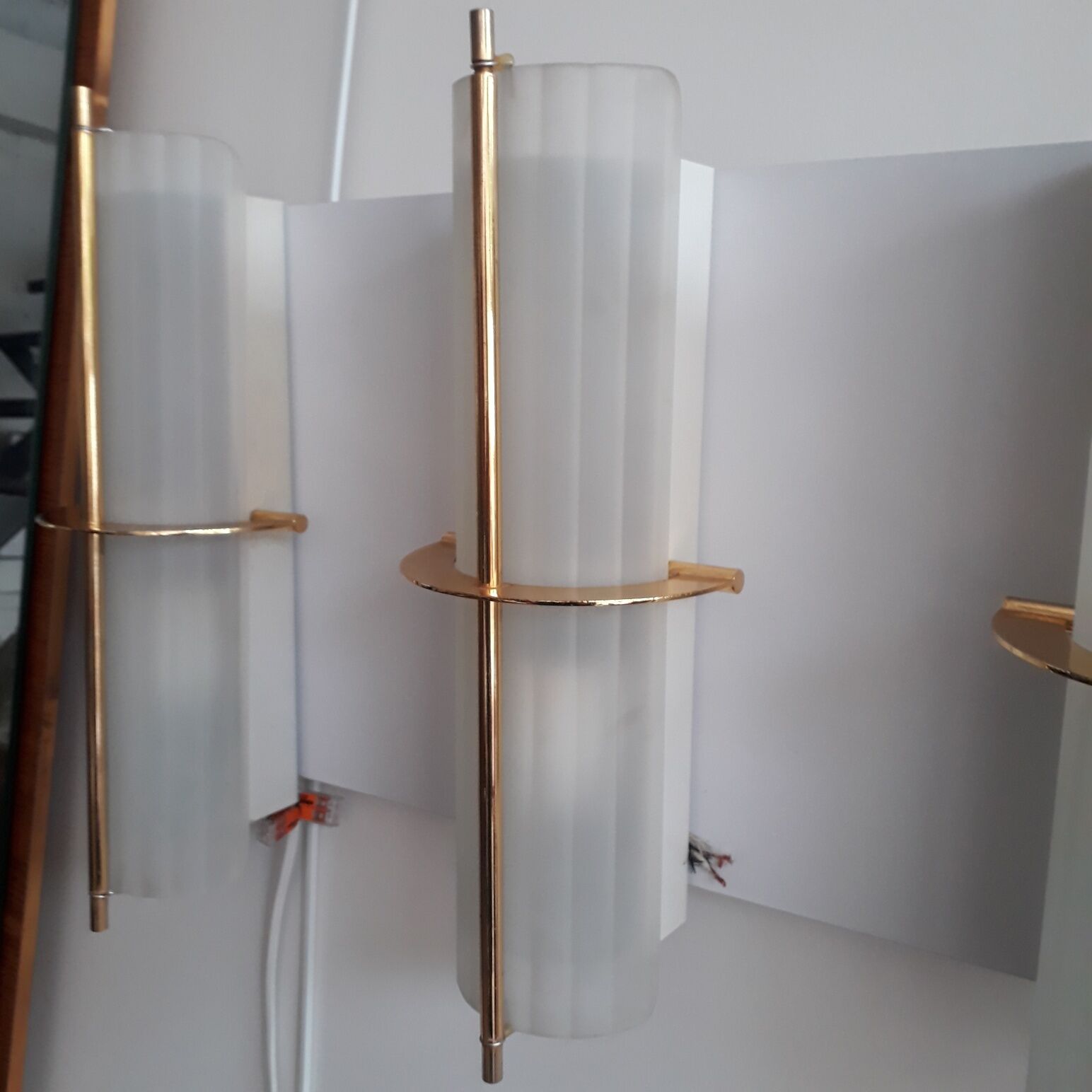 Pair of brass Arlus sconces and shortbread glass