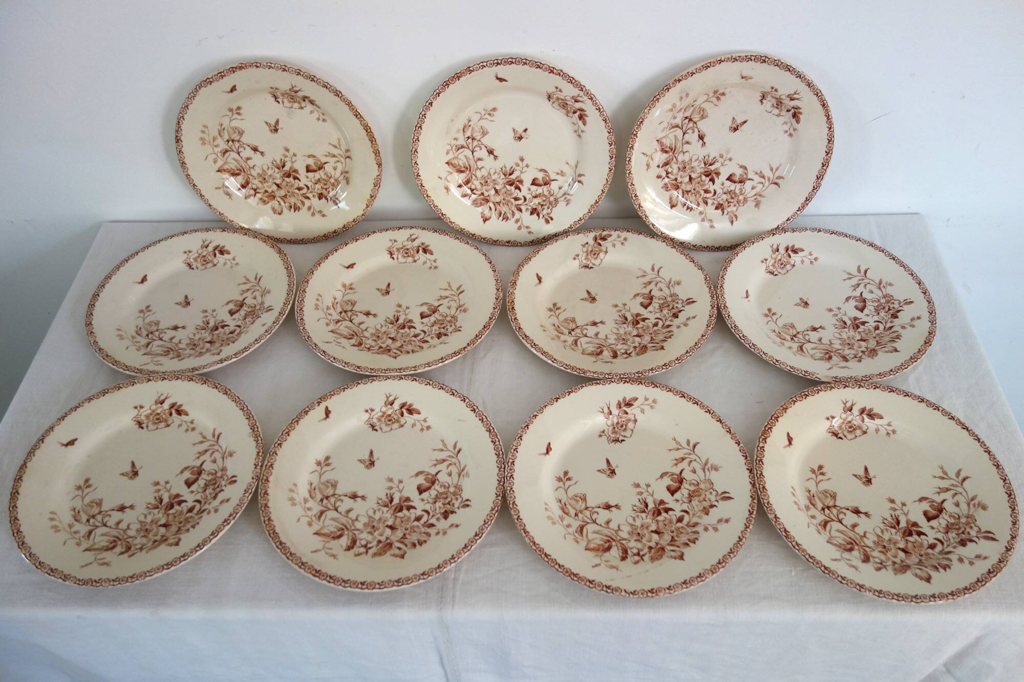 11 flat plates Terre De Fer Gien model Mai circa 1900