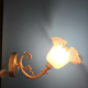 Original and vintage wall sconces, brass arm and lace tulip.