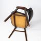 Fauteuil en bois de rose et cuir noir design danois