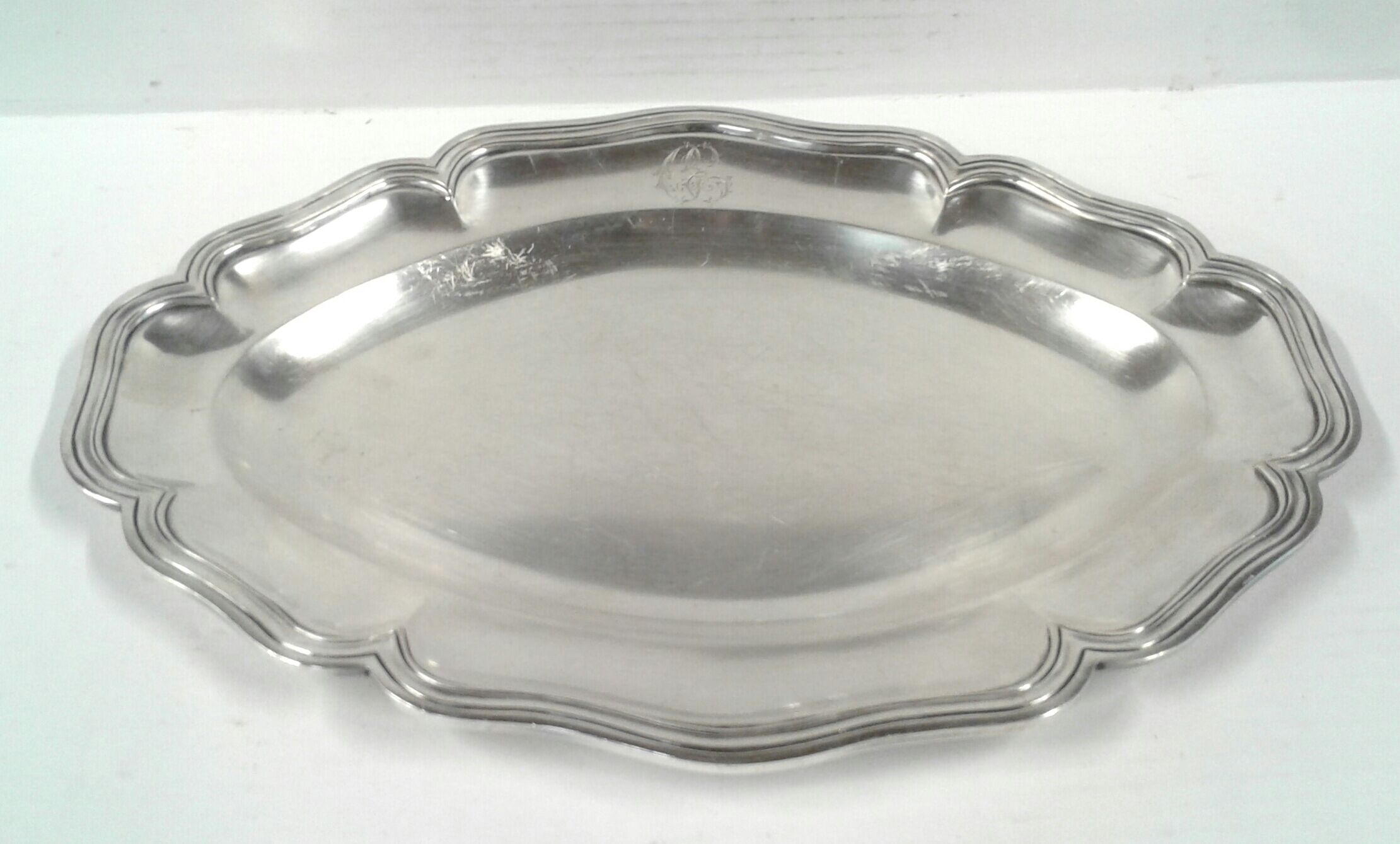 Flat oval silver metal Boulenger