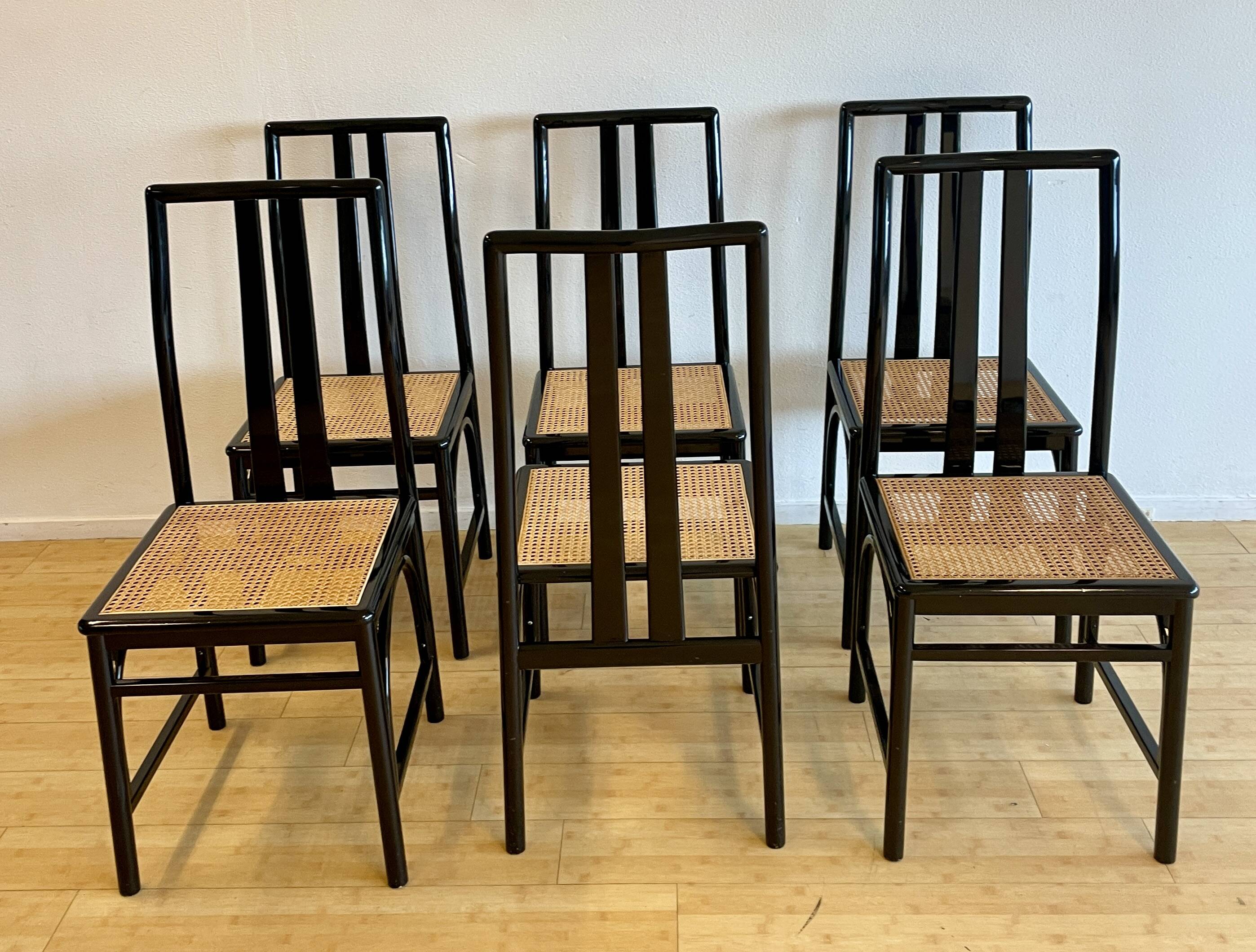 Set of 6 black lacquered and cane chairs by Montina s.p.a.