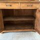 Antique dresser with glass doors and fleur-de-lys from the 50s