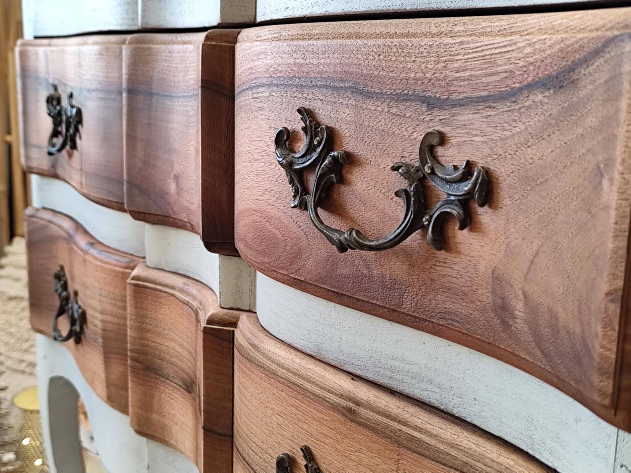 Walnut crossbow chest of drawers