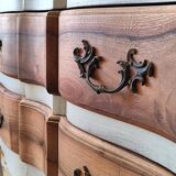 Walnut crossbow chest of drawers