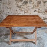 Vintage folding garden table in pine, mid-20th century.
