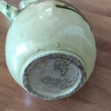 Yellow and green glazed ceramic jug