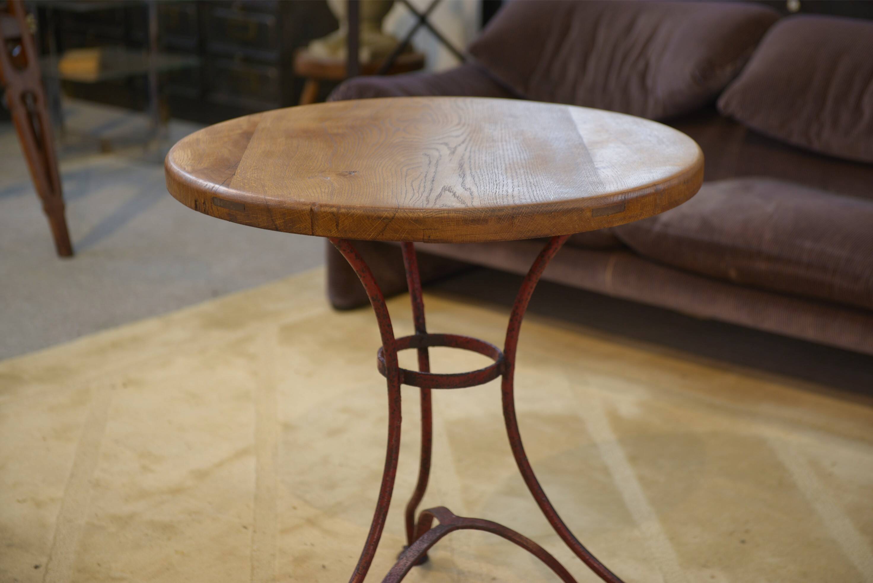 Patinated bistro table with an oak top from the 1950s.