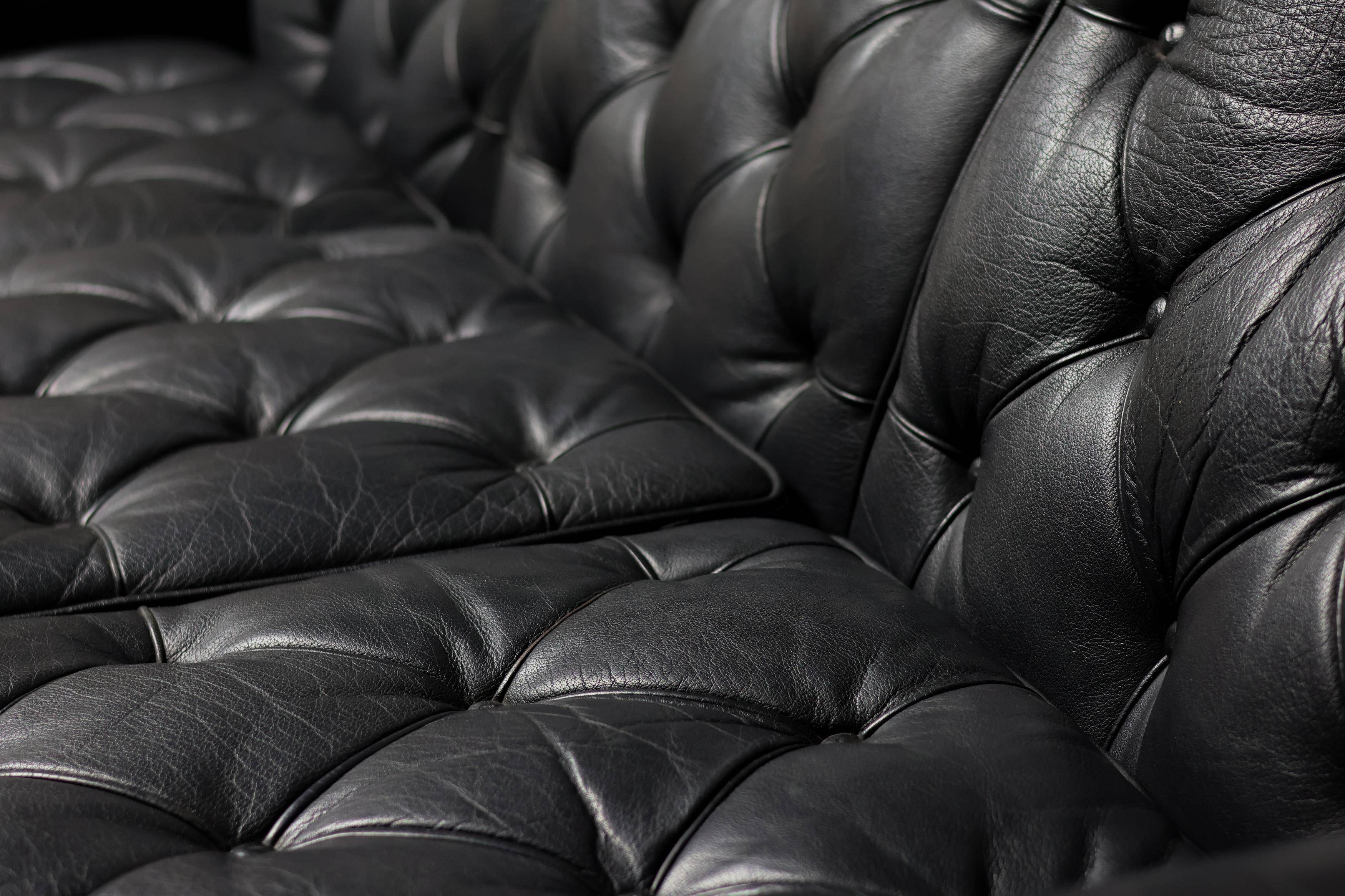 Three-seater sofa "Jupiter" in black leather by Arne Norell, Sweden, 1960.