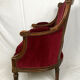 Bergère de style louis xvi garnie de velours rouge sombre, début xixe