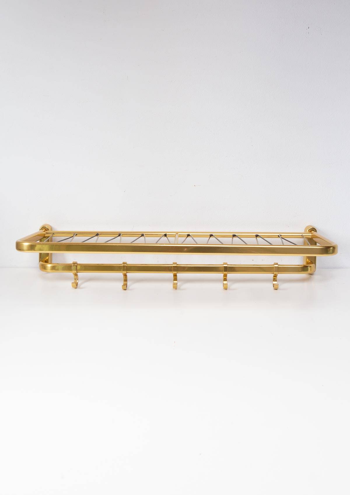 Wall-mounted coat rack with a golden aluminium shelf c. 1960 (62.5 cm)