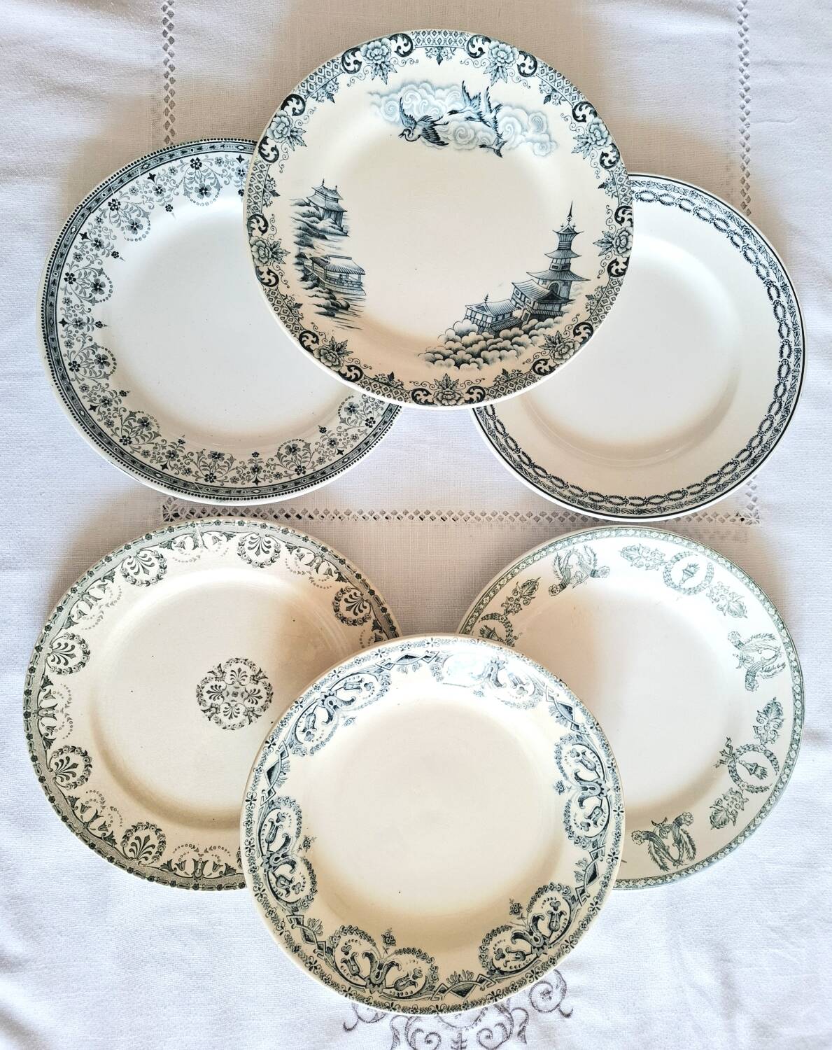 Mismatched antique ironstone earthenware plates