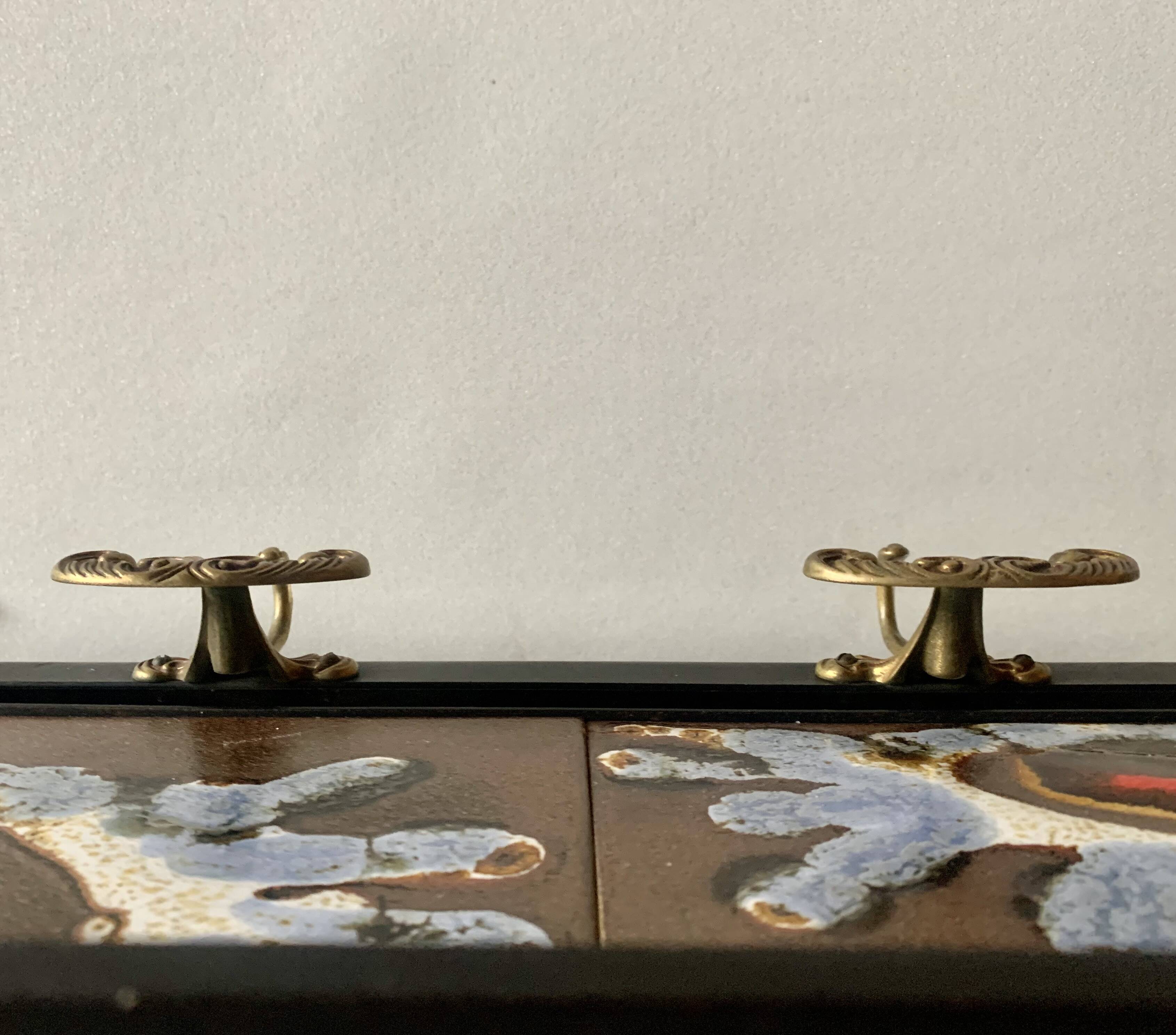 Vintage wall-mounted coat rack in steel, brass and ceramic