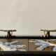 Vintage wall-mounted coat rack in steel, brass and ceramic