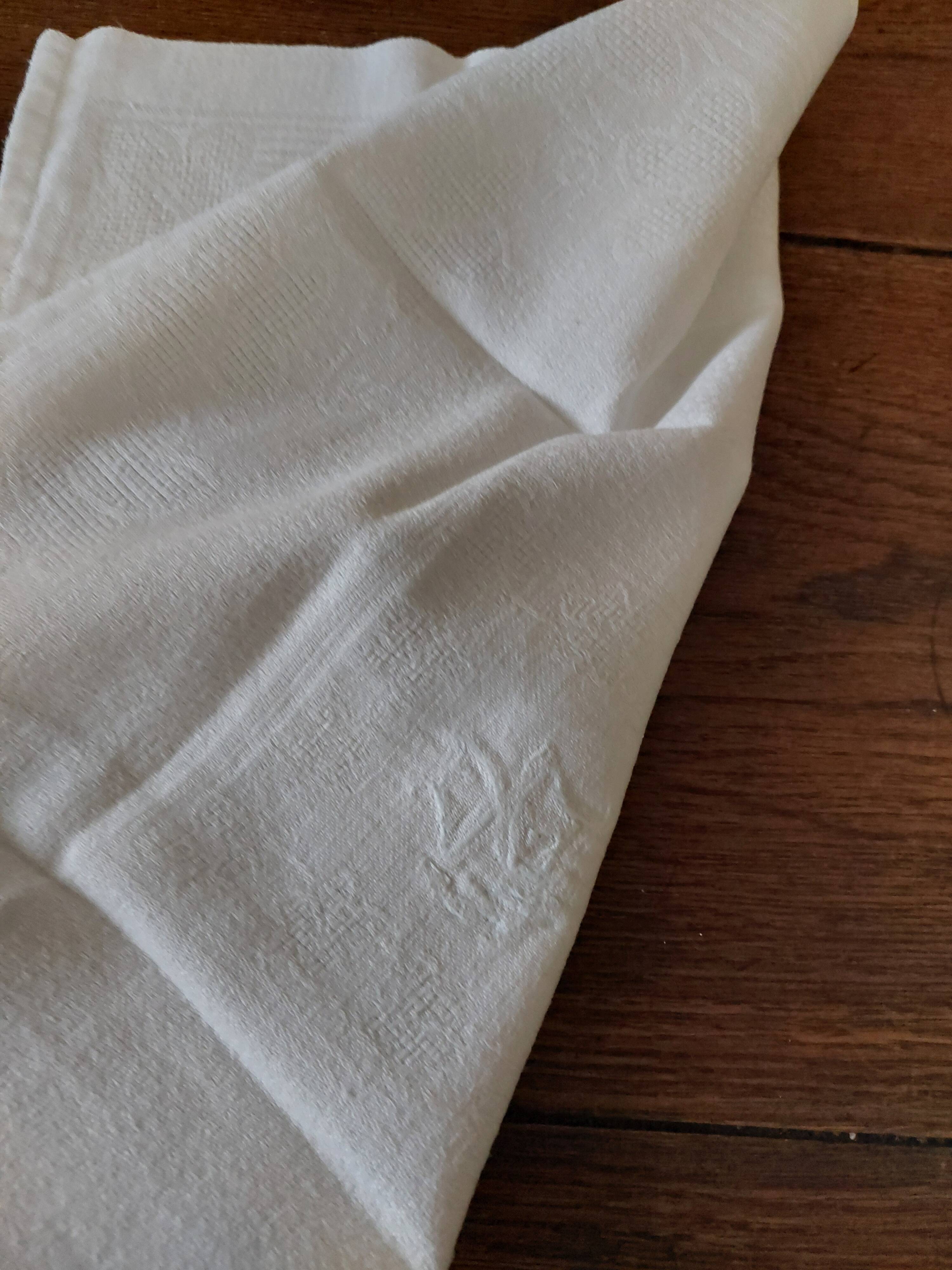 Pair of antique cotton damask napkins with AC monogram