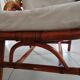 Sofa armchairs and coffee table in vintage rattan of six pieces