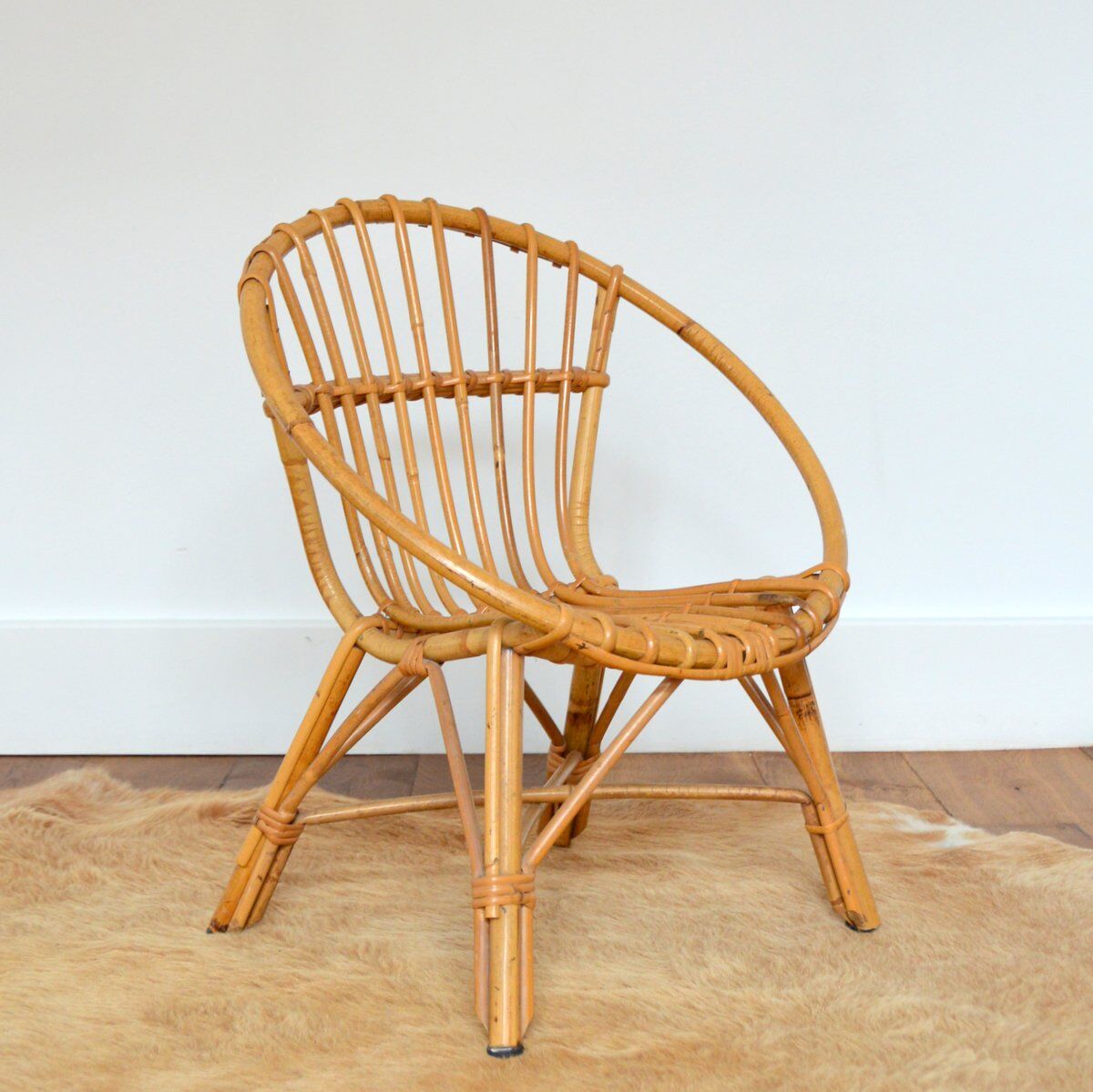 Children's shell armchair in rattan 1960s