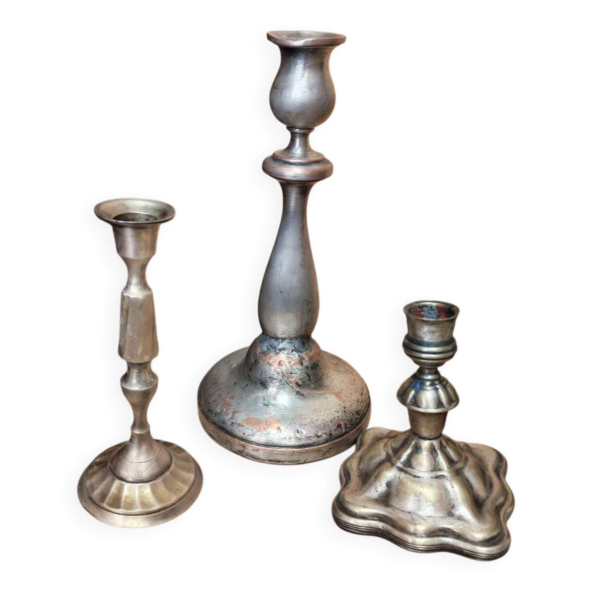 Set of three silver candle holders