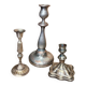 Set of three silver candle holders