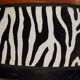Art deco armchair with zebra tapestry