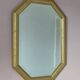 Golden octagonal mirror with bevelled glass from the 1970s.