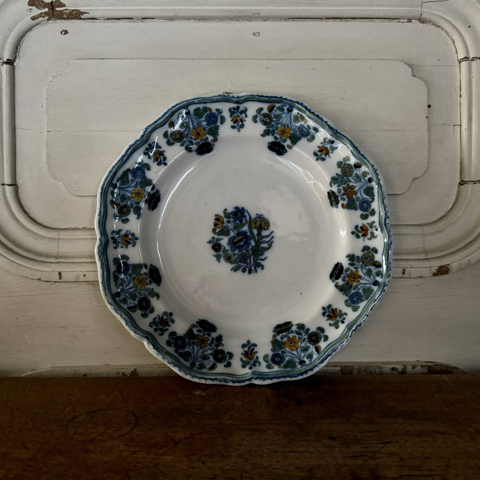18th-century Moustiers earthenware plate with floral decoration