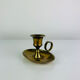 Vintage brass candlestick, rat of the cellar.
