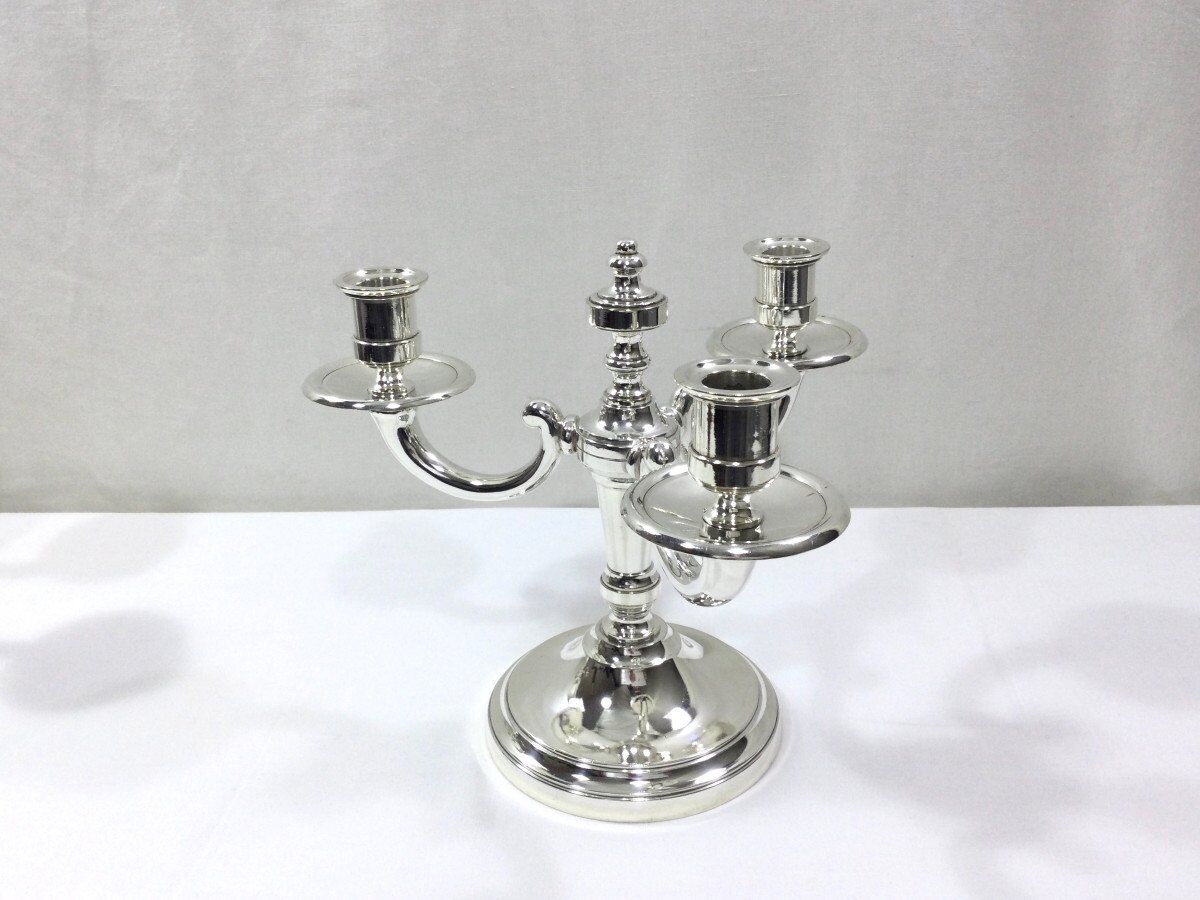 Pair of silver bronze candelabras