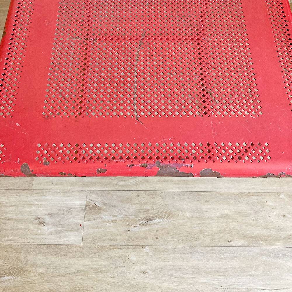 Perforated metal coffee table from the 1950s
