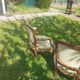 Pair of Rocaille style armchairs in green fabric and walnut, 19th century