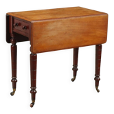 Antique mahogany coffee table with drawer and decorations, 19th century.