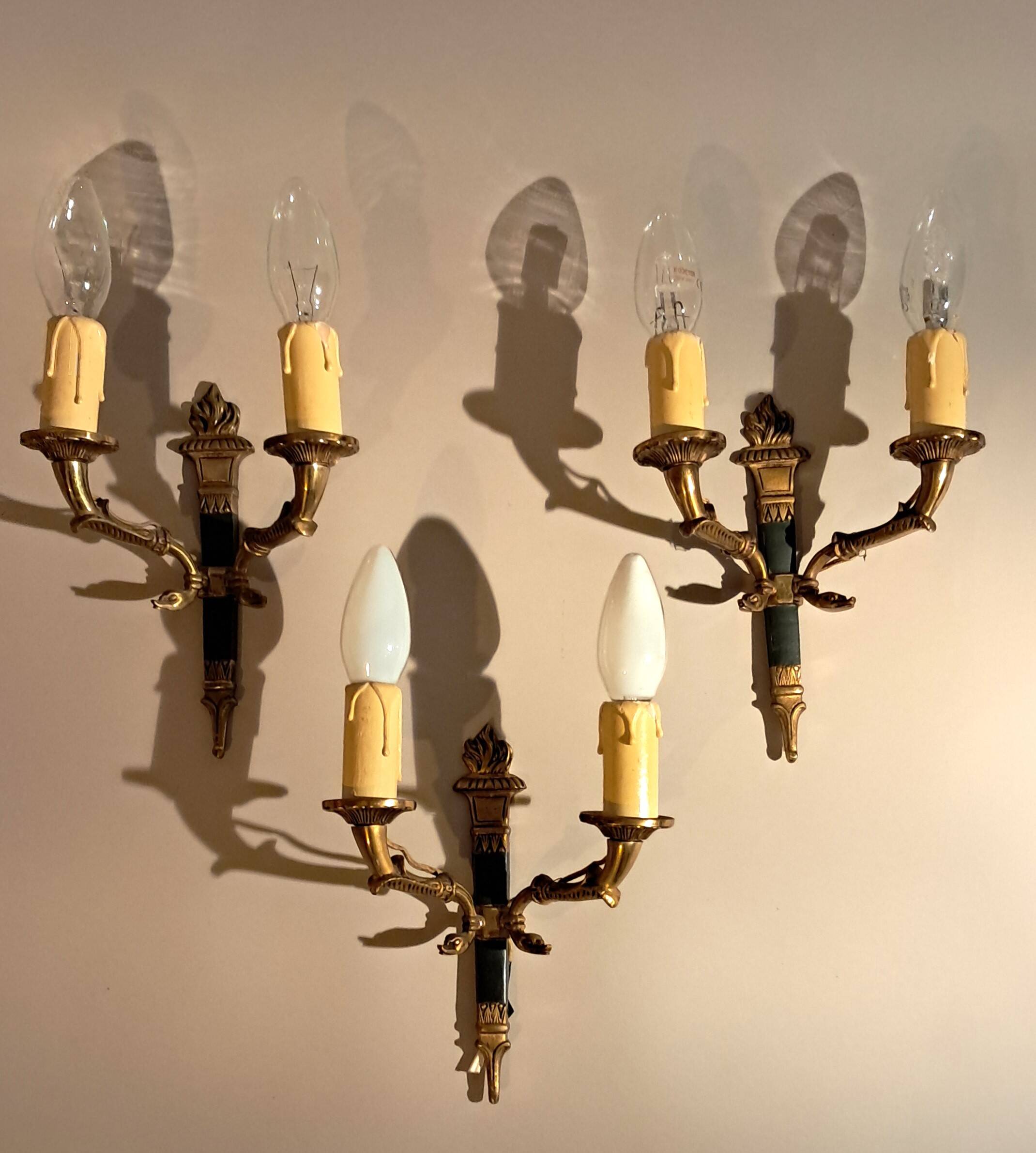 Set of 3 Empire style wall lights in bronze and gilded and green lacquered brass, Circa 1950.