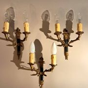 Set of 3 Empire style wall lights in bronze and gilded and green lacquered brass, Circa 1950.