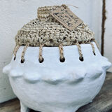 Clay and raffia pot