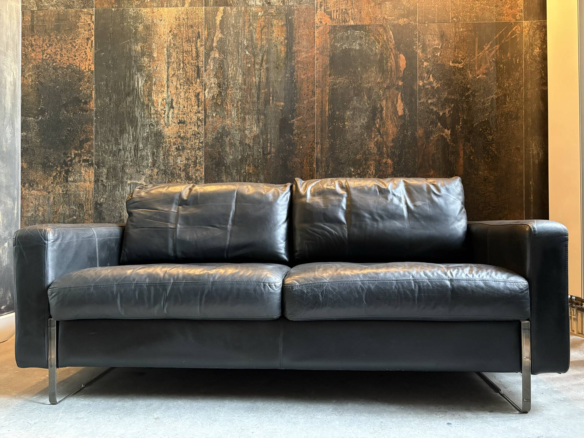Set of (2) mid-century armchairs and a 2-seater sofa.