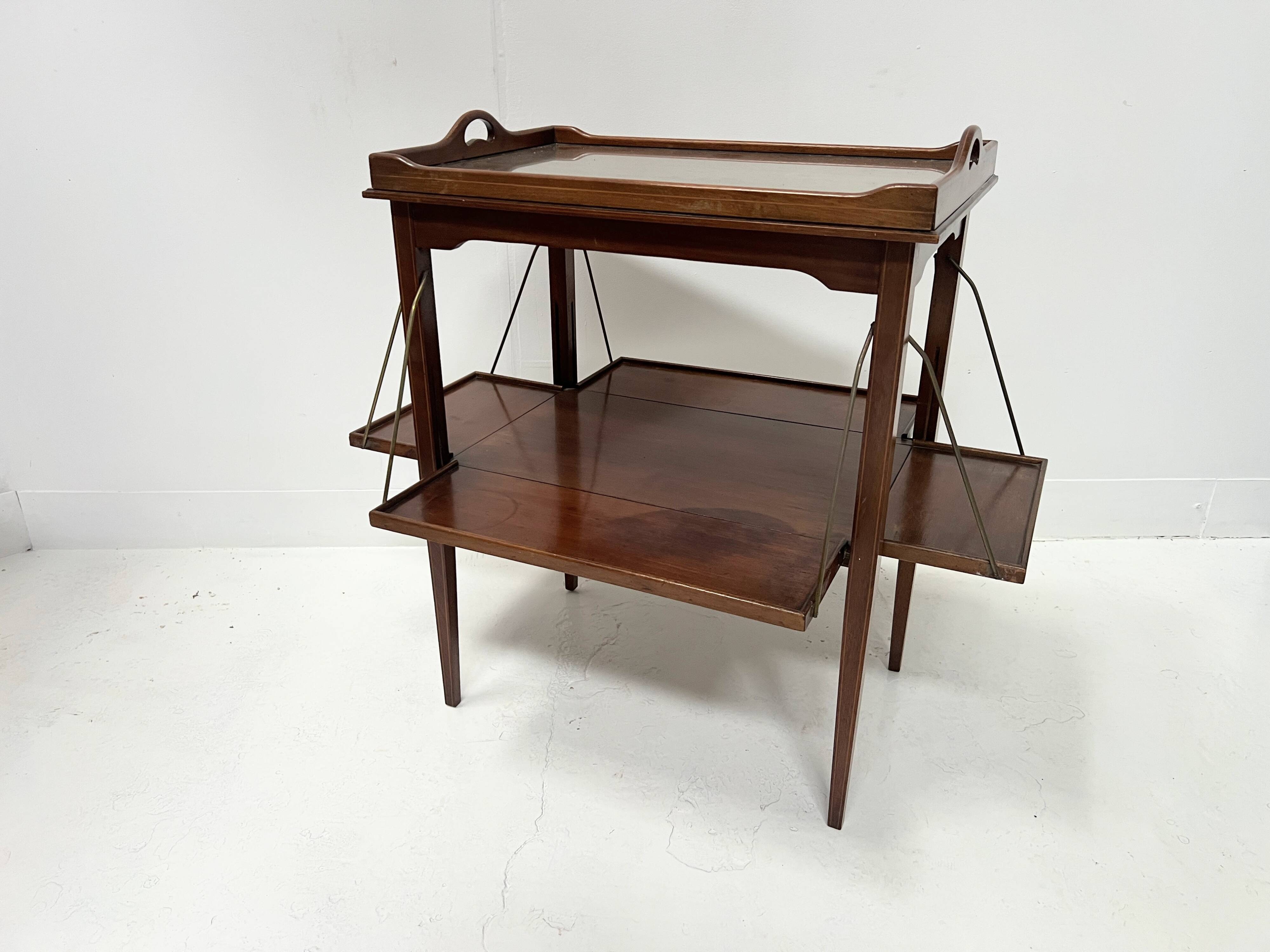 Mahogany serving table with marquetry inlay decoration, 20th century.