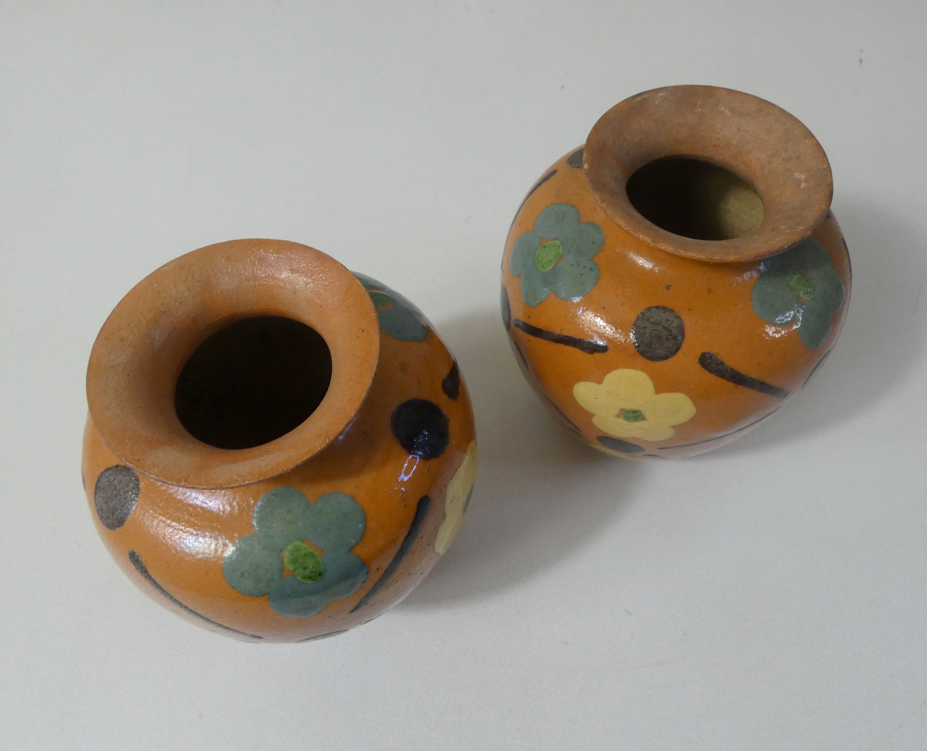 Pair of glazed terracotta vases