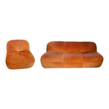 Three-seater sofa and armchair in orange velvet, 1970.