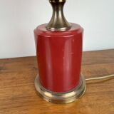 Art deco style desk lamp with a burgundy red sphere in the center the body is in lacquered iron