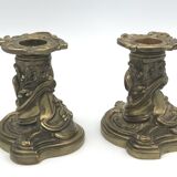 Pair of gilded bronze candlesticks with twisted decor and floral garlands, louis xv style