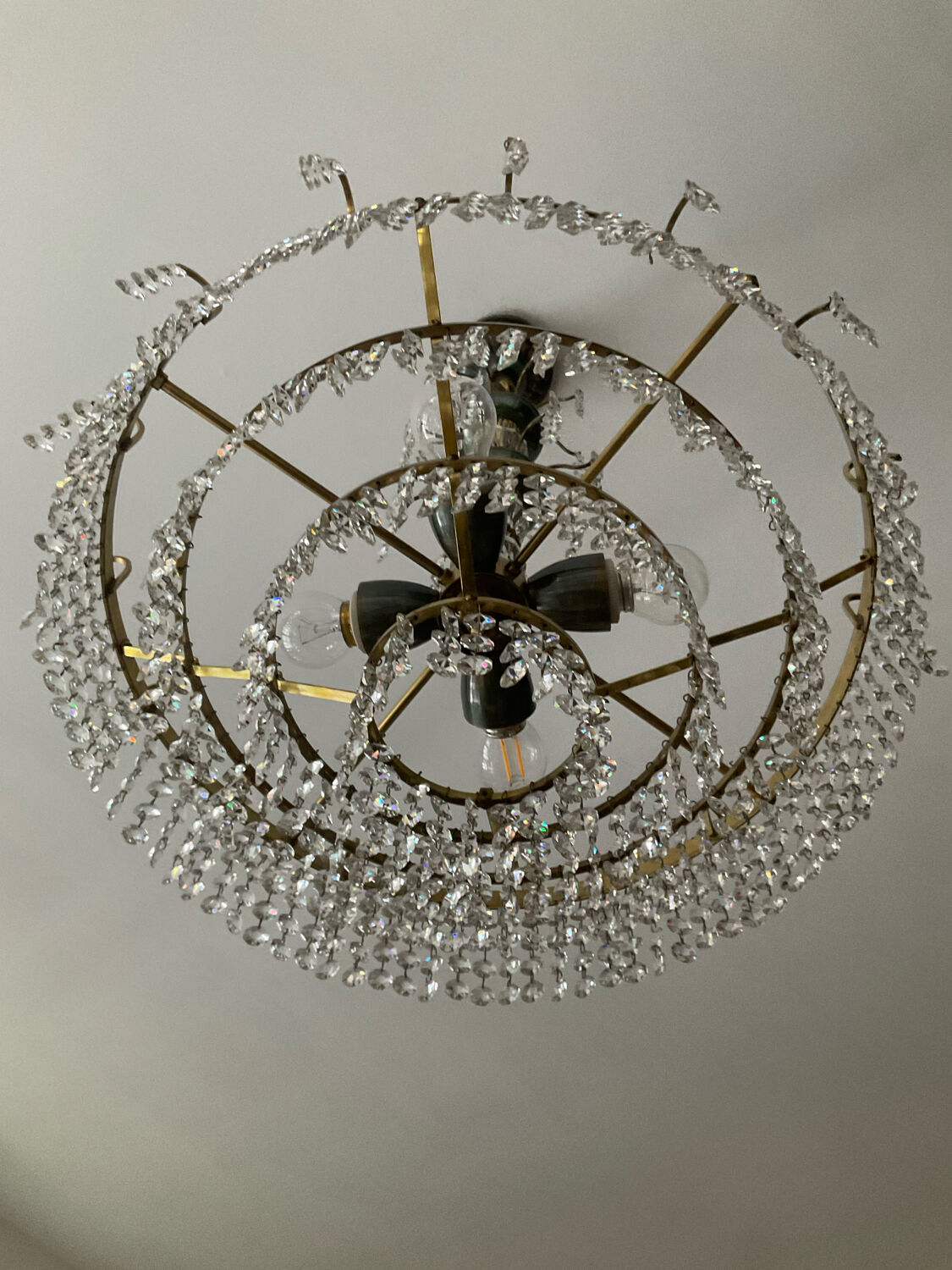 Brass chandelier with crystal pendants