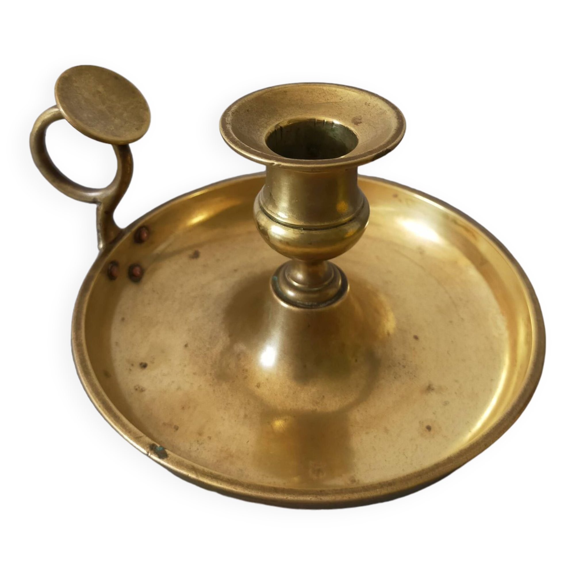 brass candle holder with old cellar rat thumb