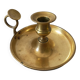 brass candle holder with old cellar rat thumb